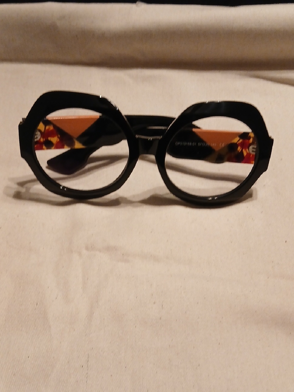 Bold Black Round Women's Glasses with Colorful Patterned Temples
